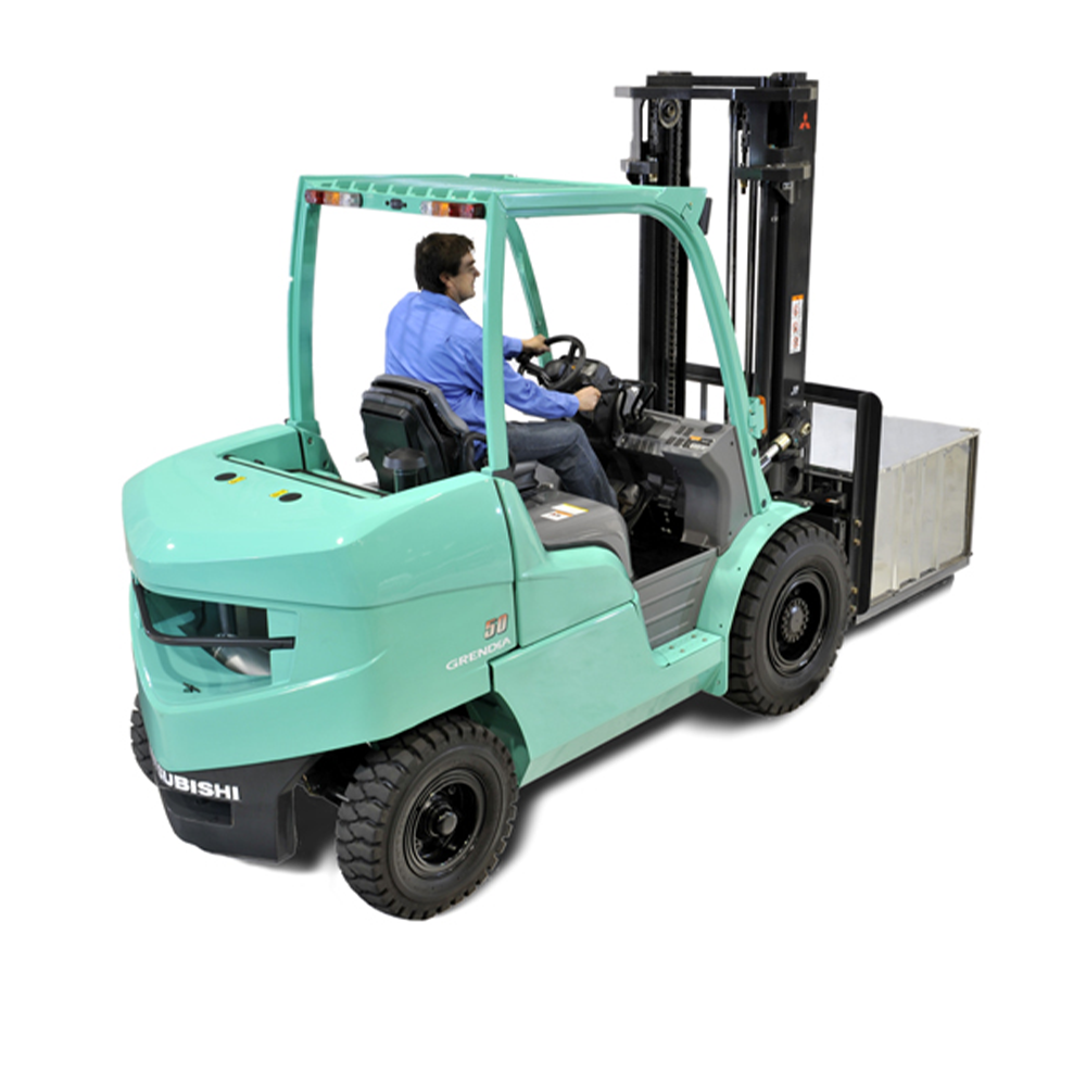 Man operating Mitsubishi forklift lifting a large metal container, showcasing the vehicle’s efficiency in industrial material handling and logistics.